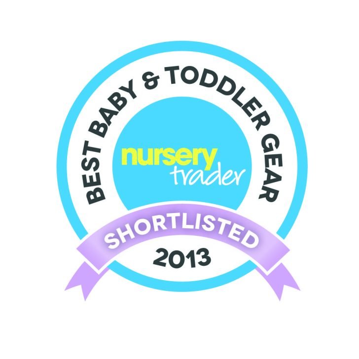 A toddler is playing with baby gear that has been shortlisted for an award in 2013.