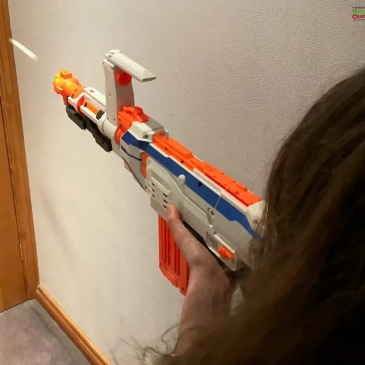 The obligatory action shot with the Nerf Gun - daughter getting stuck into the door!