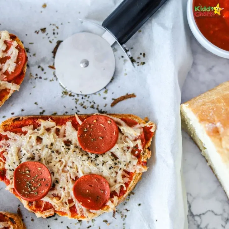 A slice of pizza with tomato sauce, pepperoni, and other ingredients is being served indoors, representing the Italian cuisine and its delicious fast food and baked goods.