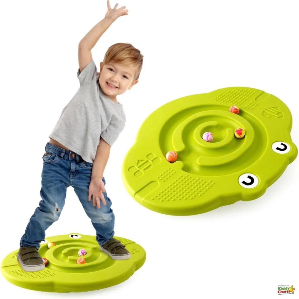 A smiling child balancing on a lime green board with maze design and balls, another identical board beside, against a white background.