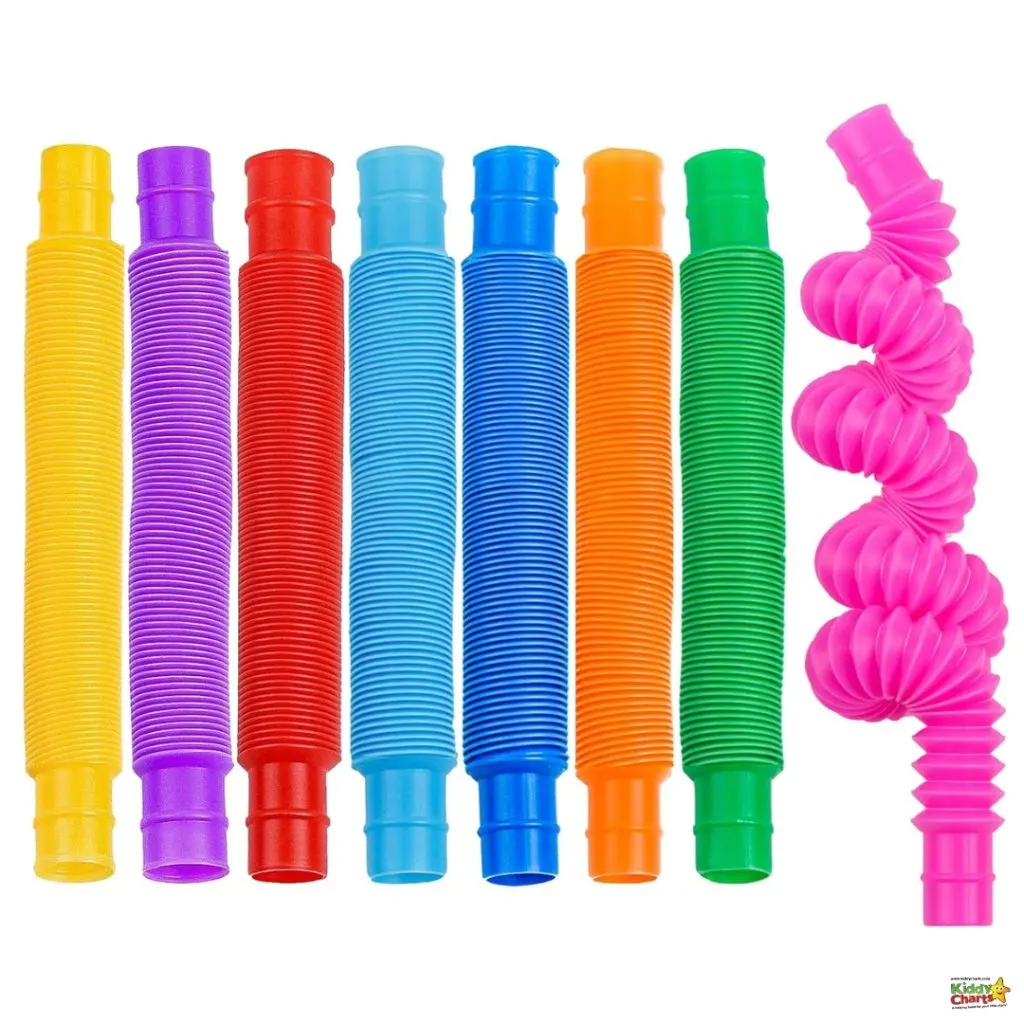 Multiple colorful plastic tubes, also known as "bendy straws," are aligned vertically with one bent straw on the right, against a white background.