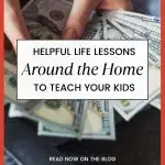 A person is counting US dollar bills with text overlay promoting life lessons around the home to teach kids, directing to a blog on KiddyCharts.com.