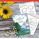 The image features educational materials on a wooden background promoting understanding of solitude and friendship in children, with a book, worksheets, and a yellow flower.